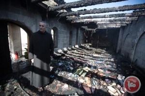 The attack totally destroyed an external atrium of the shrine, which is where Christians believe Jesus fed the 5,000 in the miracle of the five loaves and two fish.(AFP/Menahem Kahana)
